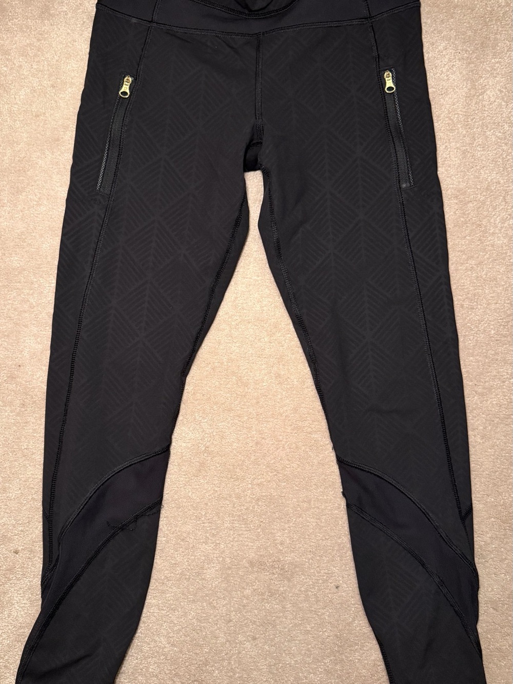 Three pairs of Lululemon athletica crop leggings with Zip Pockets